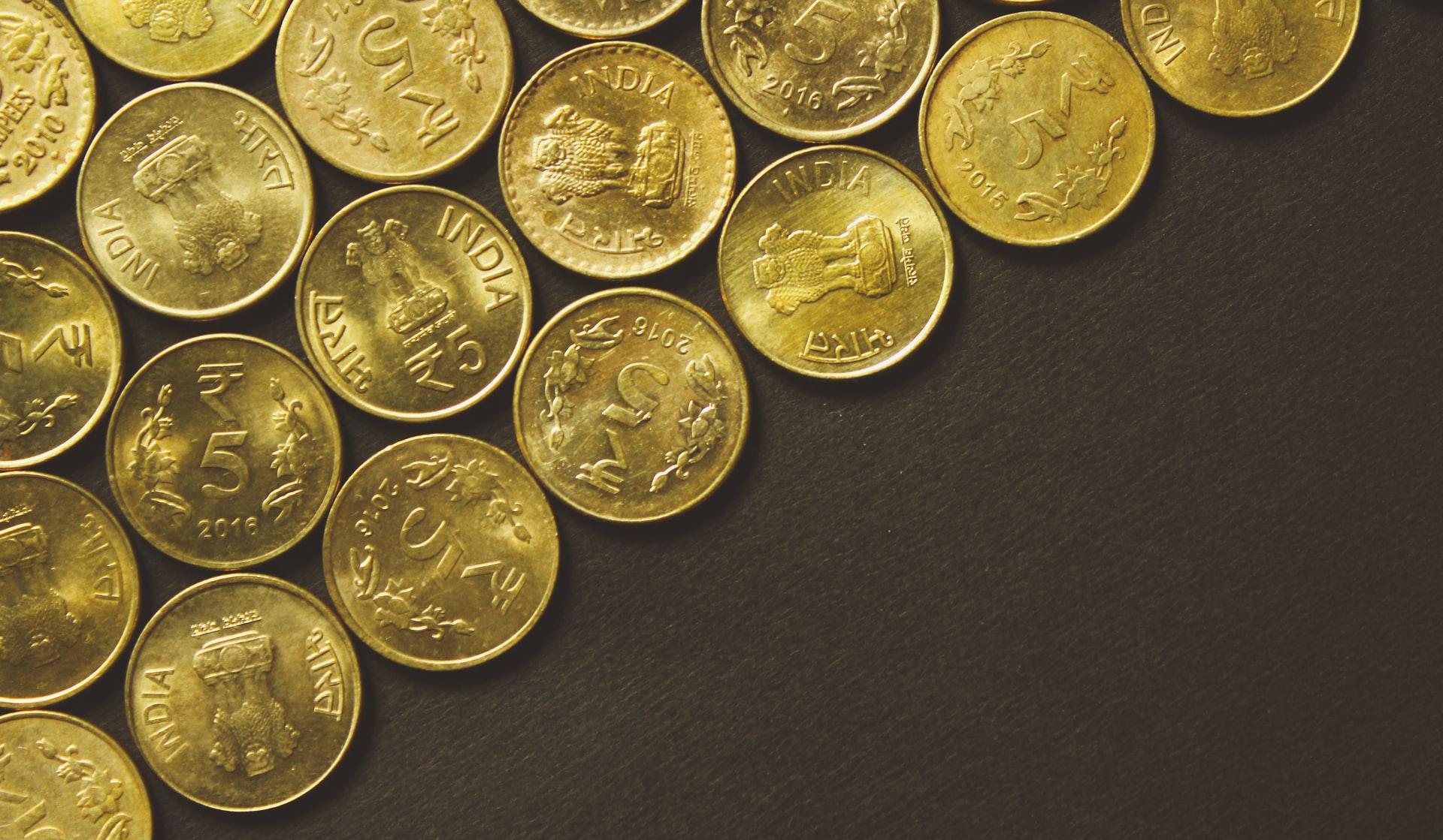 round gold-colored coins